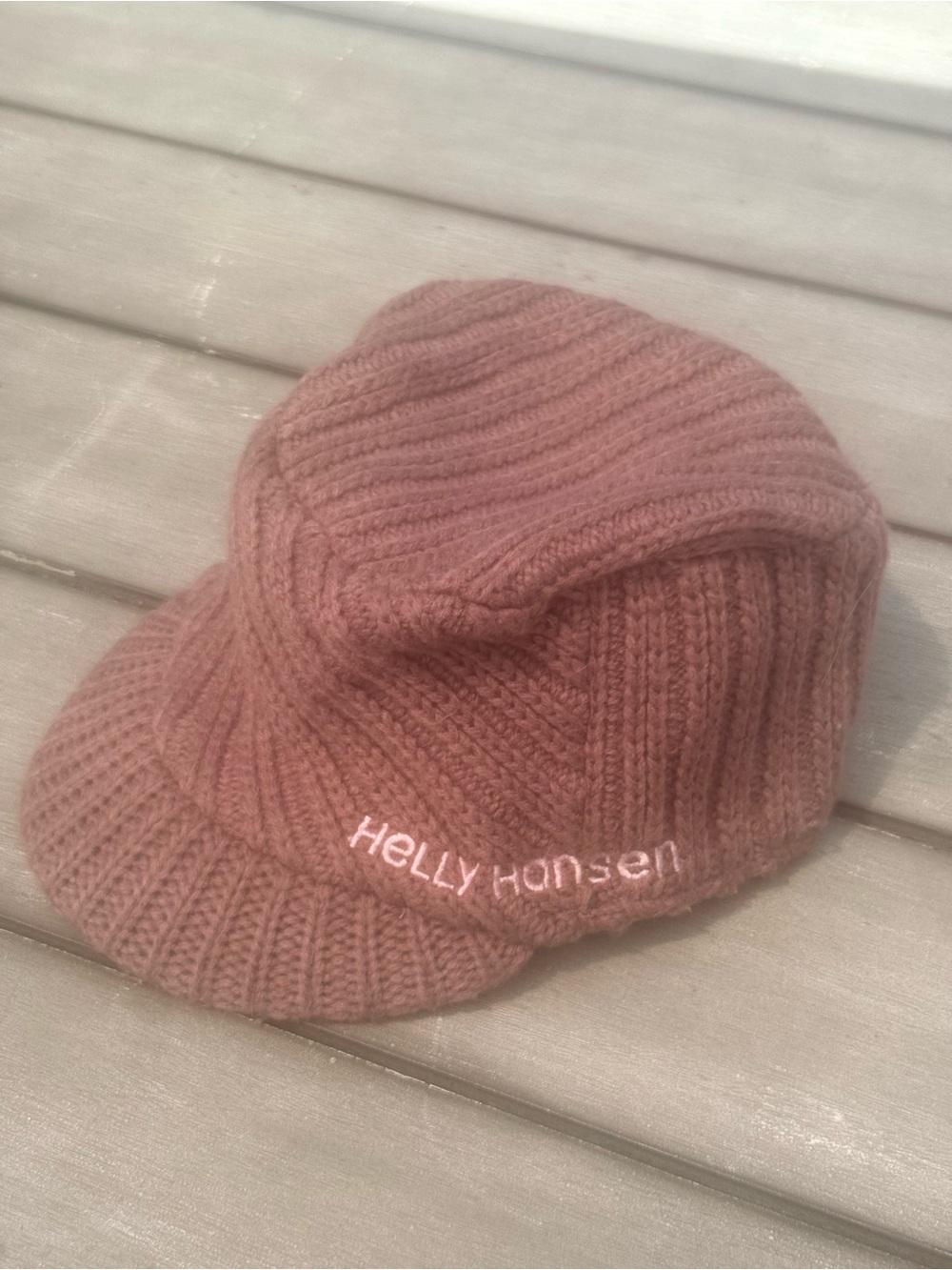 Helly Hansen women's ribbed knit beanie cap with an embroidered logo and a brim